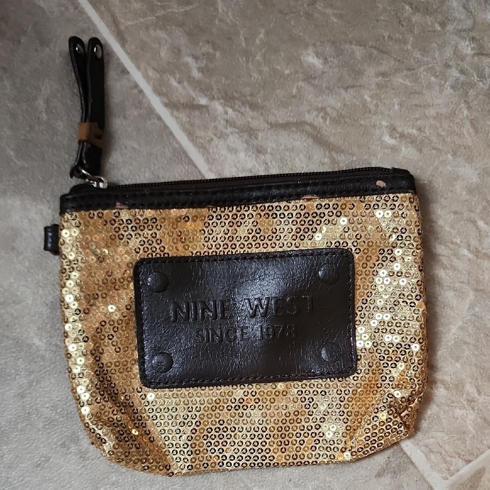 Nine West Gold Sequin Wristlet with Black Logo Patch